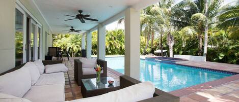 Outdoor pool, pool umbrellas, sun loungers