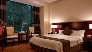 Deluxe Double Room | Blackout drapes, rollaway beds (surcharge), WiFi (free), bed sheets - Grand Villa Hotel (Guangzhou)