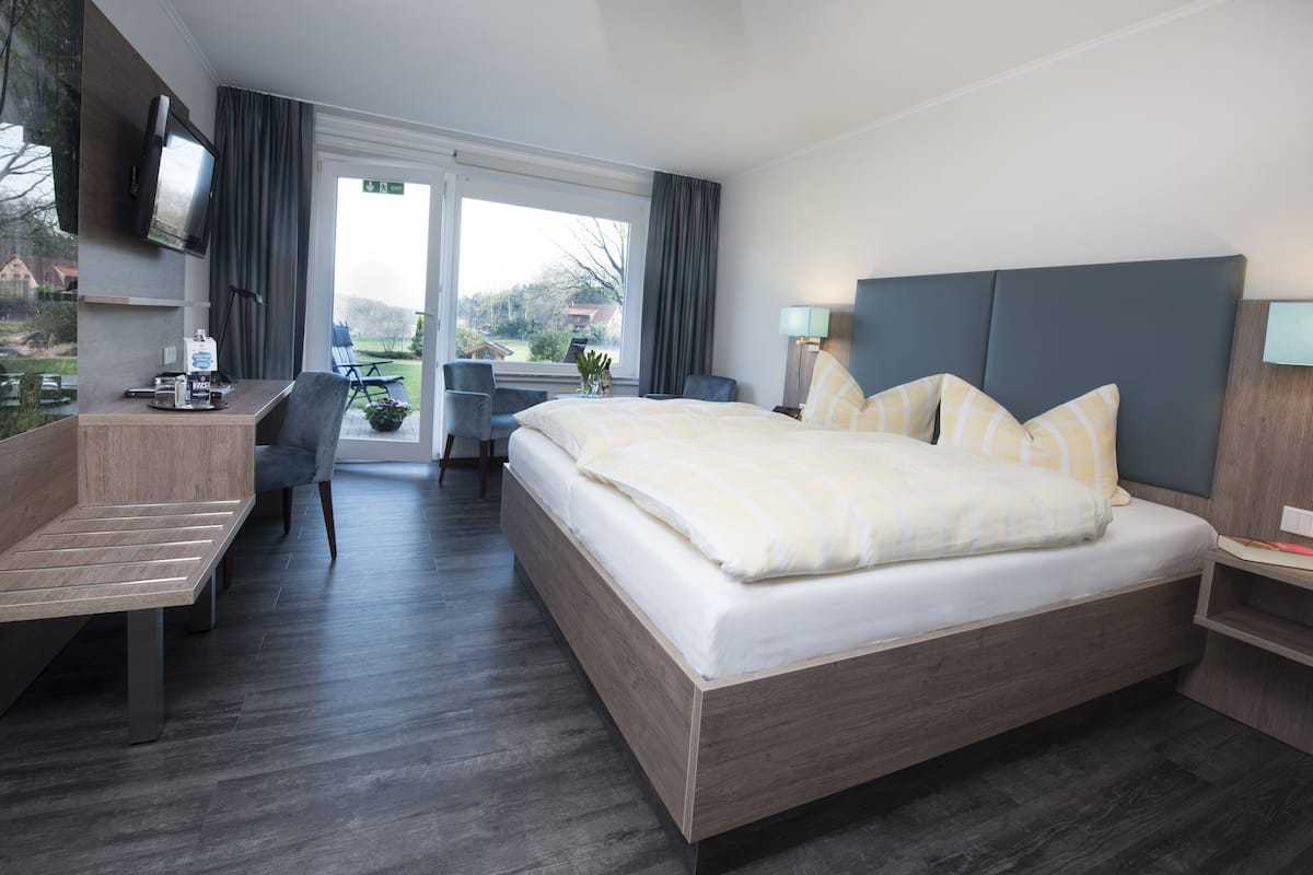 comfort double room, patio | 1 bedroom, desk, laptop workspace, free wifi