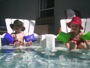 Seasonal outdoor pool, pool umbrellas, sun loungers