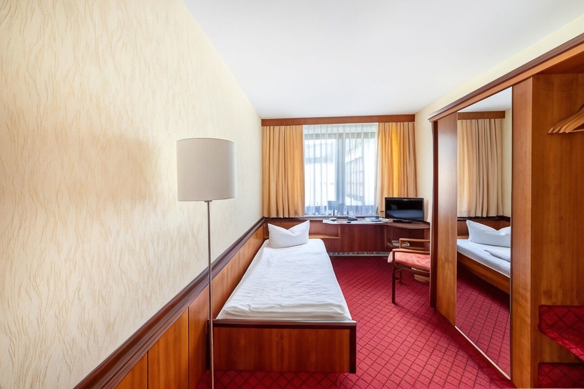 Iron/ironing board (on request), WiFi (free), bed sheets