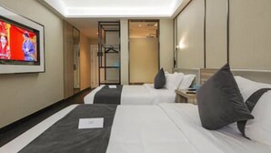 A hotel room with two beds, a TV on the wall, and a wardrobe. - Xana Lite Hotelle Shunyi (Shunyi)
