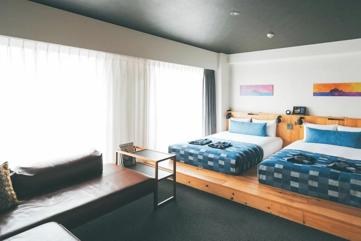 Down comforters, desk, blackout drapes, WiFi (free)