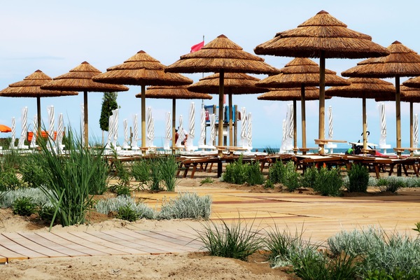 On the beach, sun loungers, beach umbrellas, beach towels