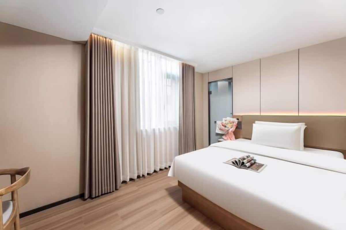 Desk, blackout drapes, soundproofing, rollaway beds