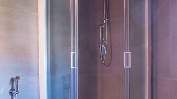 Shower, free toiletries, hair dryer, slippers
