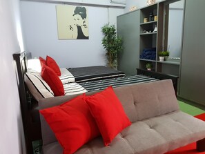 Suite familiar | Tabla de planchar con plancha, wifi gratis y ropa de cama