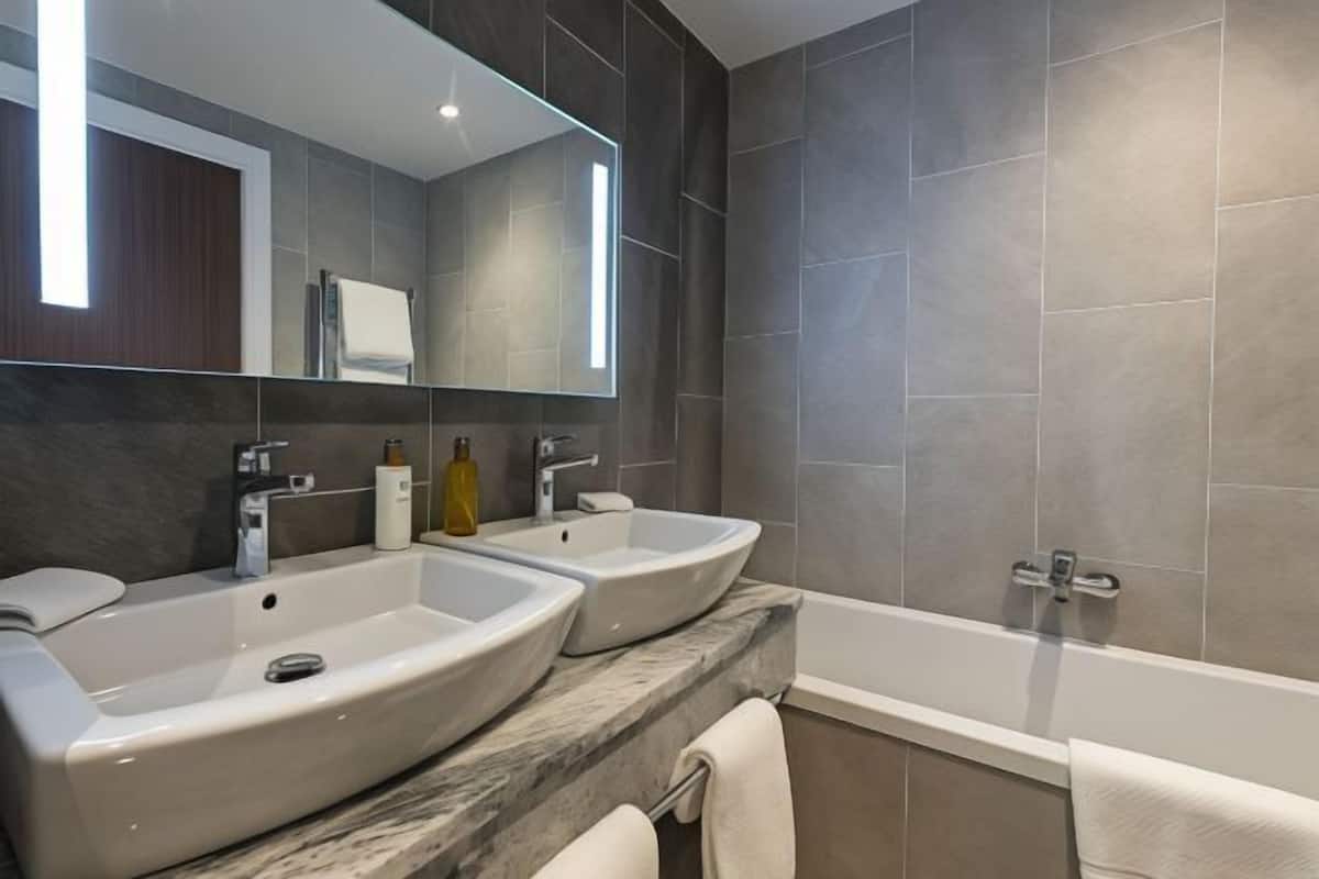 Bathroom | Separate tub and shower, eco-friendly toiletries, hair dryer, bathrobes