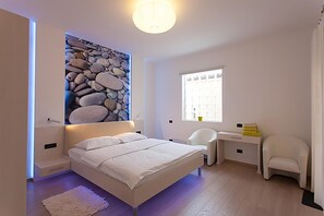 Apartemen, Beberapa Tempat Tidur | 1 kamar tidur, dilengkapi dengan perabotan berbeda-beda, dan meja kerja