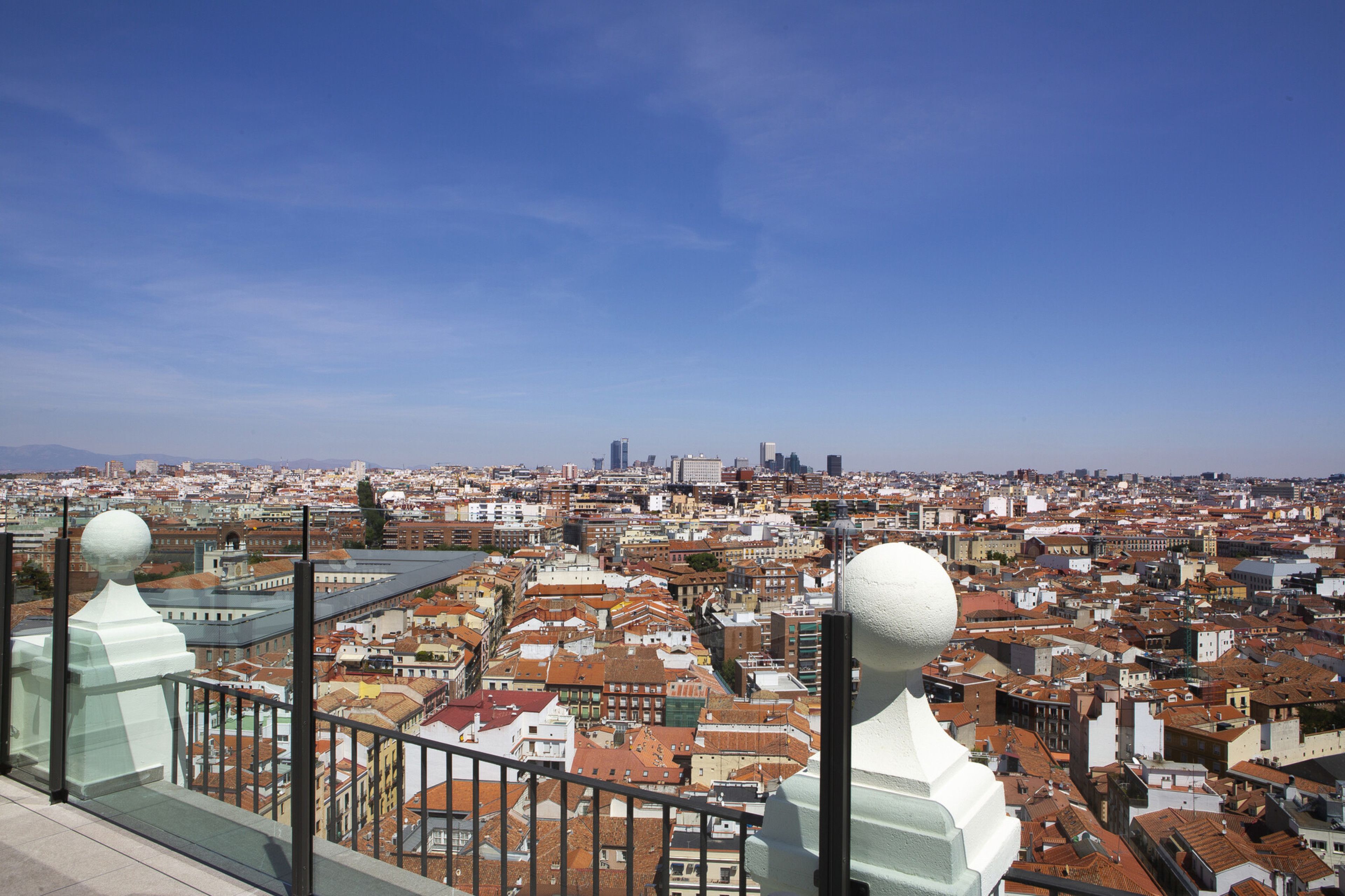 A cityscape with a view of buildings and a distant skyline.