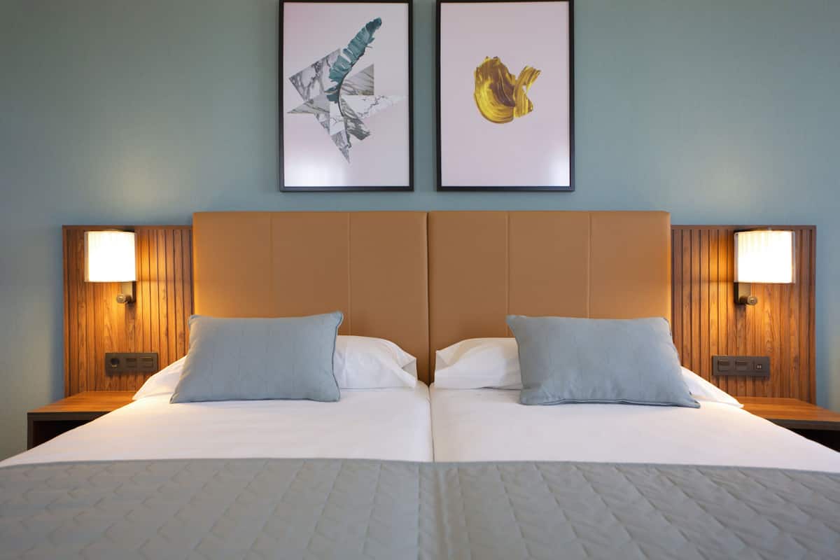 deluxe room (superior twin) | 2 bedrooms, in-room safe, desk, free cots/infant beds