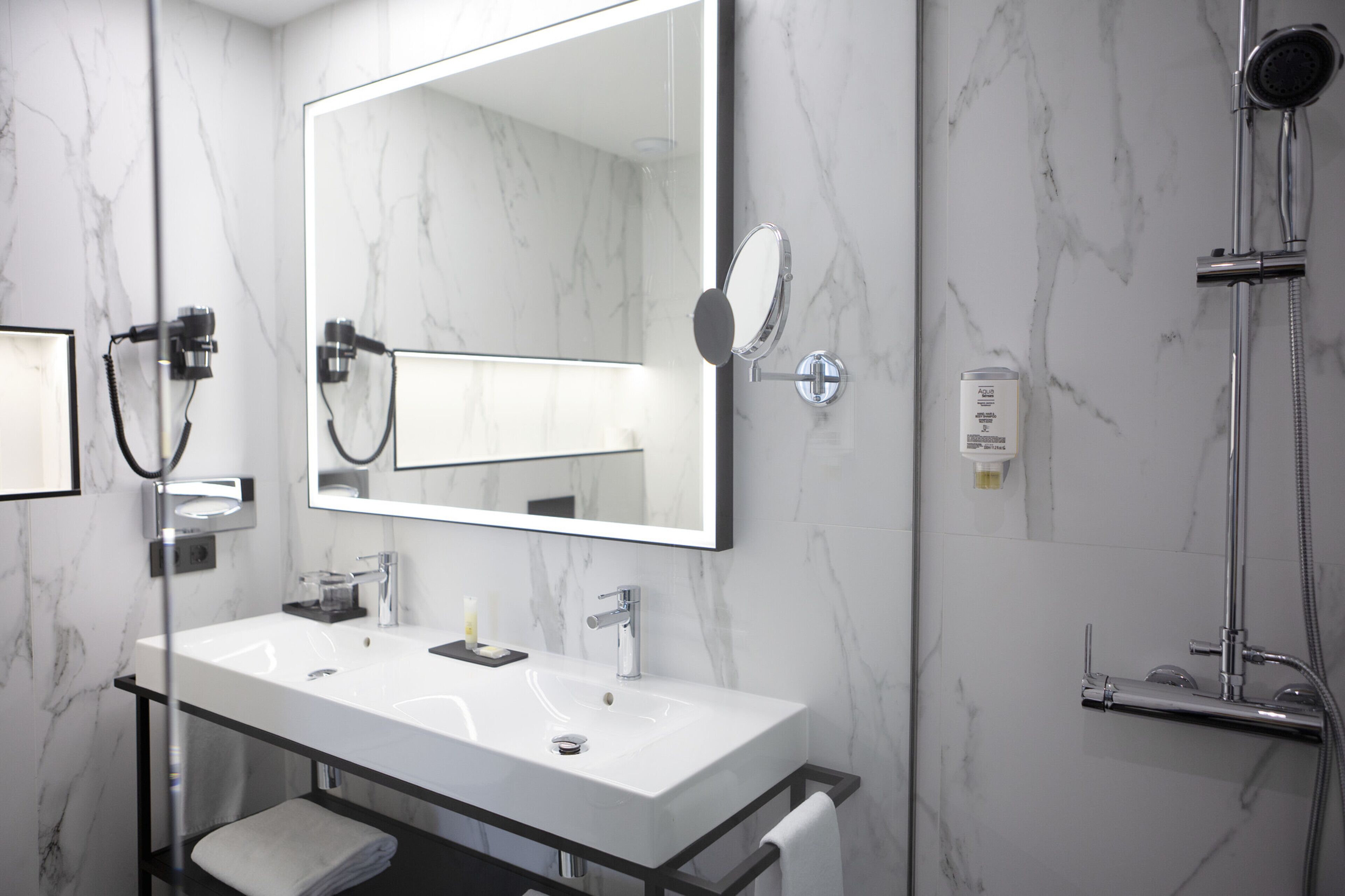 Shower, rainfall showerhead, eco-friendly toiletries, hair dryer