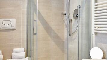 Shower, free toiletries, hair dryer, bathrobes
