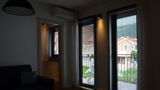 Departamento de diseñador, 1 cama Queen size y sofá cama | Área de sala de estar | Televisión LCD