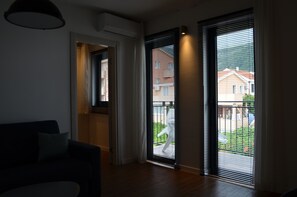 Design Apartment, 1 Queen Bed with Sofa bed | Living area | LCD TV