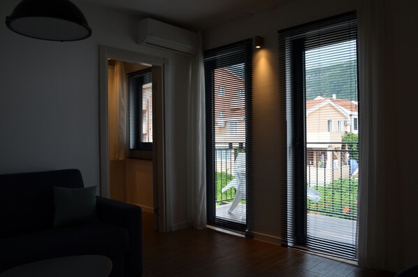 Design Apartment, 1 Queen Bed with Sofa bed | Living area | LCD TV