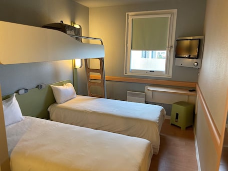 Desk, blackout drapes, soundproofing, free WiFi