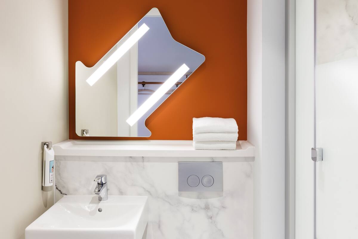 shower, eco-friendly toiletries, towels