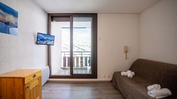 Family Apartment | Living area | Flat-screen TV