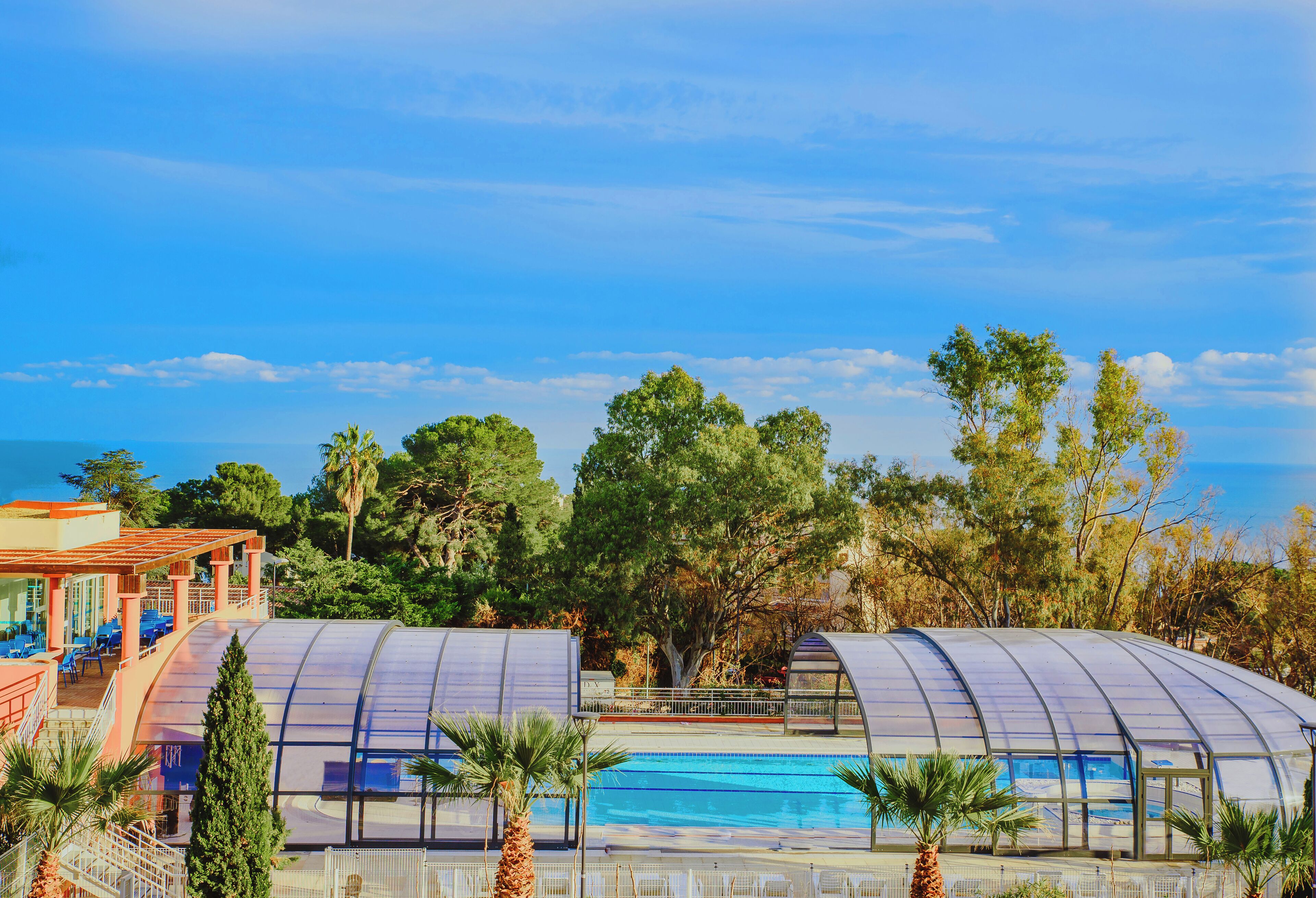 Indoor pool, pool umbrellas, sun loungers