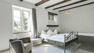 Desk, blackout drapes, soundproofing, iron/ironing board