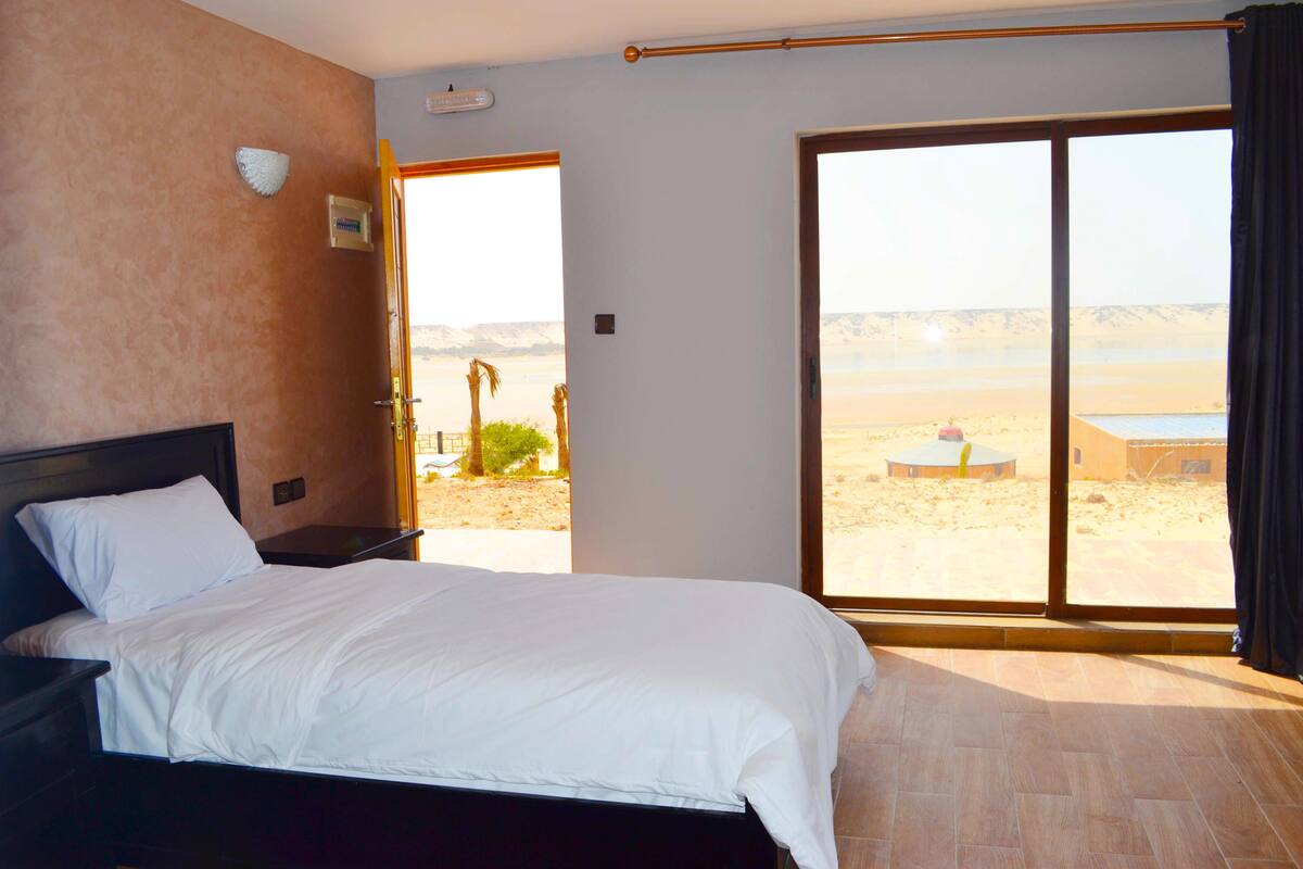 Premium bedding, blackout curtains, free WiFi, bed sheets