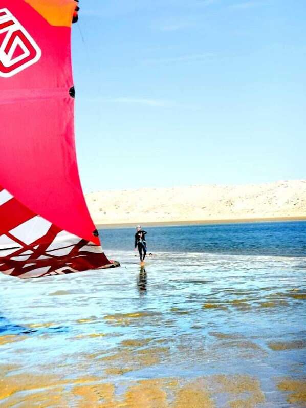 On the beach, white sand, waterskiing, fishing