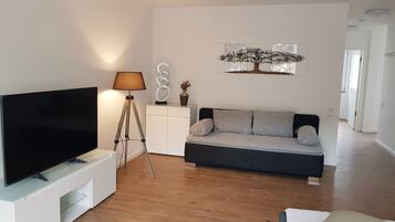Comfort-Apartment | Wohnbereich | Flachbildfernseher