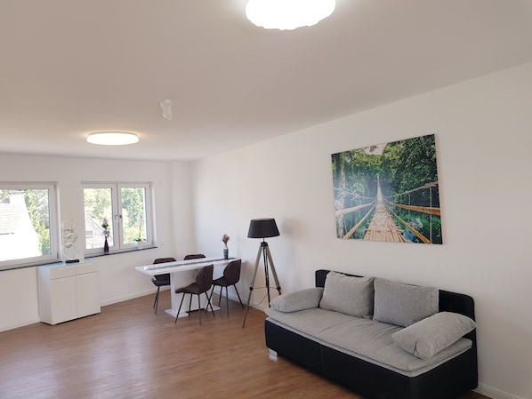 Apartment, 1 Bedroom | Living area | Flat-screen TV