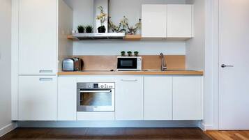 Apartment, 1 Bedroom | Private kitchenette | Fridge, microwave, oven, stovetop