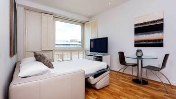 Apartment, 1 Bedroom | Living room | TV