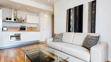 Apartment, 1 Bedroom | Living room | TV