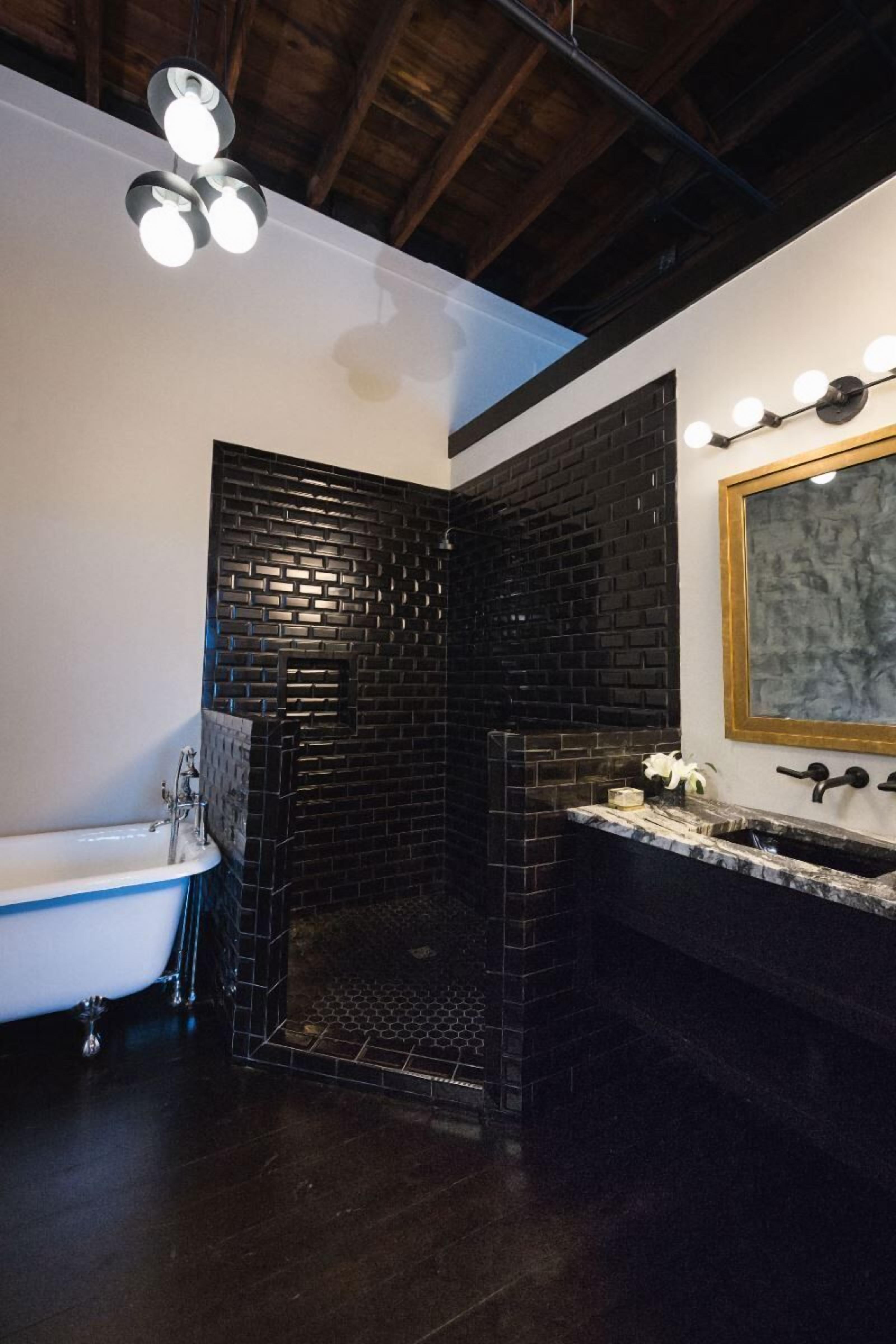 superior suite, 1 king bed with sofa bed, bathtub | bathroom | designer toiletries, hair dryer, bathrobes