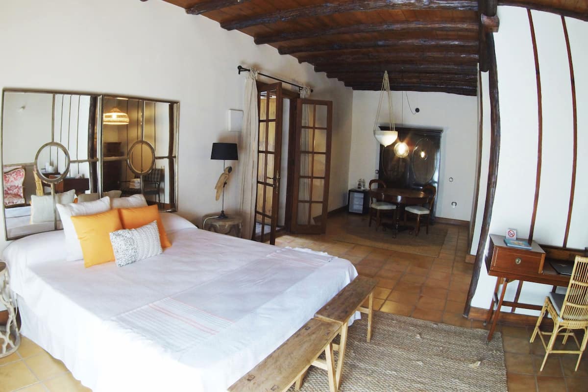 Junior Suite (#1 Casillas del Angel) | 1 bedroom, individually decorated, individually furnished