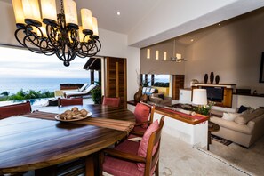 Superior Villa, 5 Bedrooms | Living area | Flat-screen TV, iPod dock