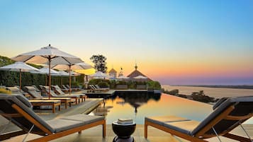 Outdoor pool, pool umbrellas, sun loungers