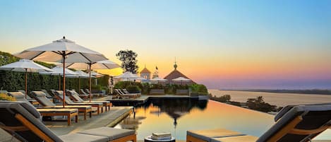 Outdoor pool, pool umbrellas, pool loungers