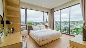 Desk, blackout drapes, iron/ironing board, free cribs/infant beds