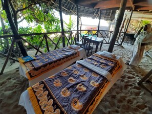 Massages aux pierres chaudes, massages des tissus profonds