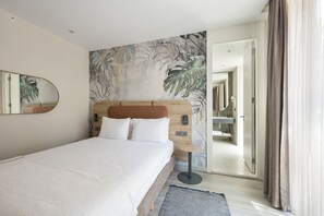 Habitación doble estándar | Sábanas de algodón egipcio, ropa de cama de alta calidad y minibar