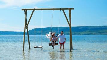 Private beach, sun loungers, beach umbrellas