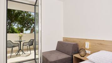 Double or Twin Room, Terrace, Sea Facing | Minibar, desk, soundproofing, bed sheets