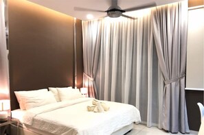 Deluxe Apartment, Multiple Beds, Non Smoking | 1 bedroom, desk, blackout drapes, iron/ironing board - KtY Suite Atlantis Residence (Malacca City)