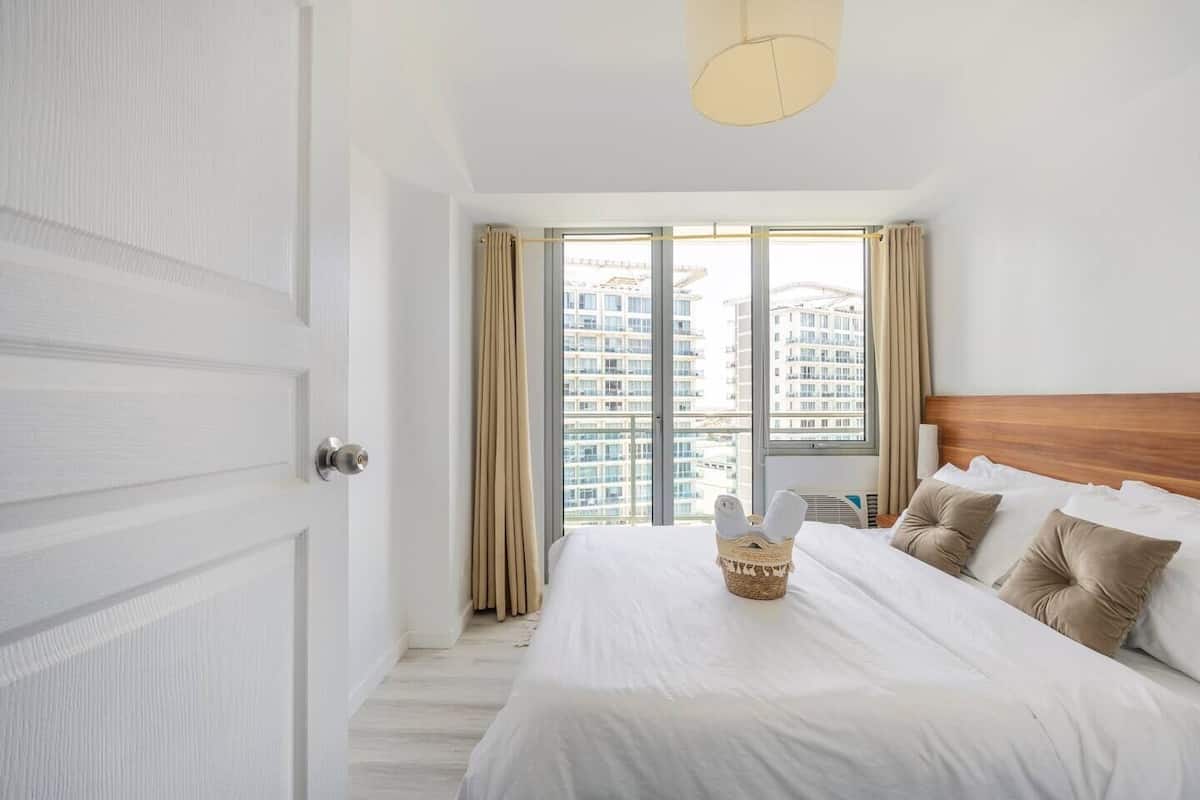 Adam'sCrib Apartment by Azure Residences 2 Bedrooms | 2 bedrooms, hypo-allergenic bedding, in-room safe