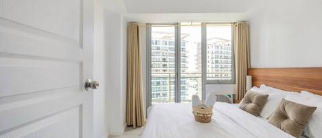 Adam'sCrib Apartment by Azure Residences 2 Bedrooms | 2 bedrooms, hypo-allergenic bedding, in-room safe