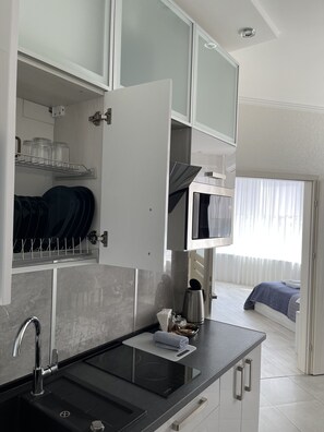 Deluxe-Apartment, 1 Queen-Bett und Schlafsofa | Eigene Küche