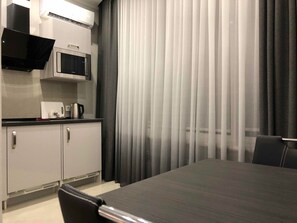 Superior Studio, 1 Bedroom | Private kitchen | Full-sized fridge, microwave, stovetop, coffee/tea maker - The Rooms Apart (Odesa)