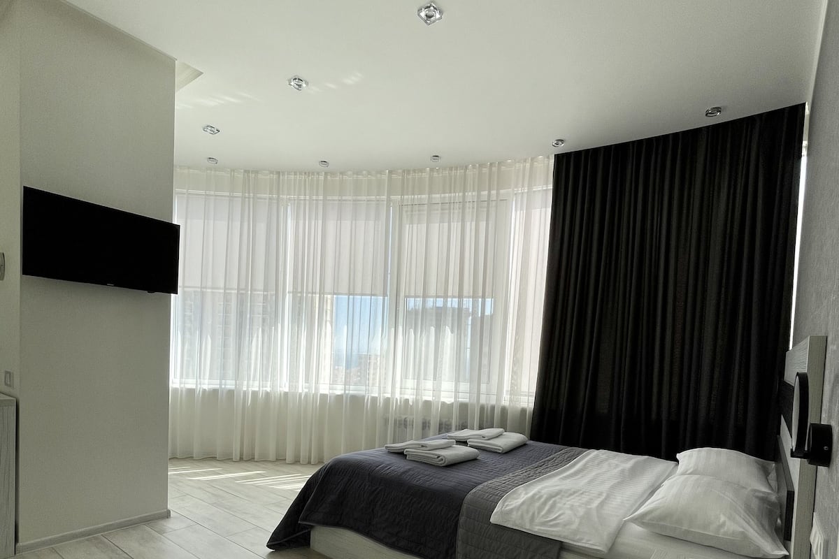 Deluxe-Apartment, 1 Queen-Bett und Schlafsofa | Hochwertige Bettwaren, Zimmersafe, Schreibtisch, Verdunkelungsvorhänge