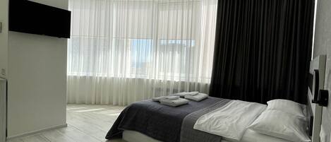 Deluxe Apartment, 1 Queen Bed with Sofa bed | Premium bedding, in-room safe, desk, blackout drapes