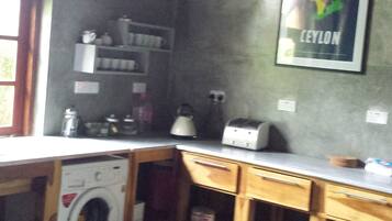 4-Bedroom Villa | Private kitchen | Full-sized fridge, oven, stovetop, coffee/tea maker